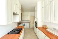 Elegante Wohnung in historischer Villa mit Dachterrasse und Blick ins Grüne