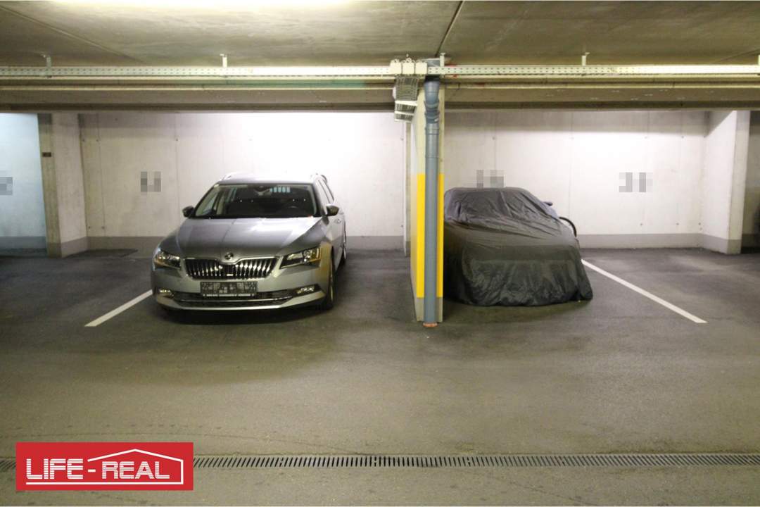 2 vermietete Tiefgaragenplätze in gefragter Lage, in Traun