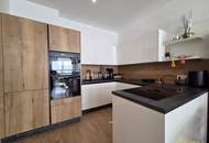 BALKONWOHNUNG MIT TIEFGARAGE IN TOPLAGE! BRILLIANTER 3-ZIMMER GRUNDRISS MIT FERNBLICK UND RUHELAGE! NAHE U1 KAGRANER PLATZ.