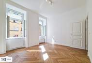 Energetisch revitalisierter Altbau: Hochwertige 4-Zimmer-Wohnung mit Balkon in zentraler Lage