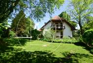 Einfamilienhaus in zentraler Bestlage mit Tennisplatz auf parkähnlichem Grund!