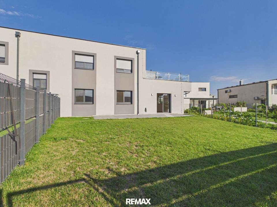 Wohnen mit Urlaubsfeeling: ETW mit Terrasse, Garten & Badeteichzugang