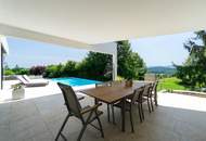 Luxus im Grünen: Architektenvilla mit mediterranem Flair und Alpenpanorama