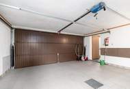 "Familienfreundliches Einfamilienhaus mit Wellnessbad, Sauna, Kachelofen, Fußbodenheizung, großem Garten und Doppelgarage in Tulln"