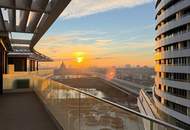 Sonnenuntergang über der Donau und Stephansdom