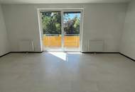 Geförderte Wohnung mit Balkon, Tiefgaragenplatz & Miete-Kaufoption