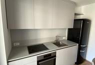 Moderne Neubauwohnung im Zentrum – mit Loggia u. Lift ! TIEFGARAGENPLATZ und KONTROLLIERTE WOHNRAUMBELÜFTUNG