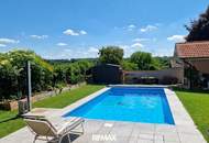 Neuwertiges 5-Zi. Einfamilienhaus mit Pool, 2 Terrassen & 2 Garagen in Deutsch-Haslau!