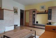 Möblierte 2-Zimmer-Wohnung mit Balkon, Grünblick und Tiefgarage in absoluter Ruhelage