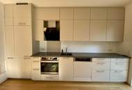 "3 Zimmer Dachgeschosswohnung mit zwei Balkone und Garage"