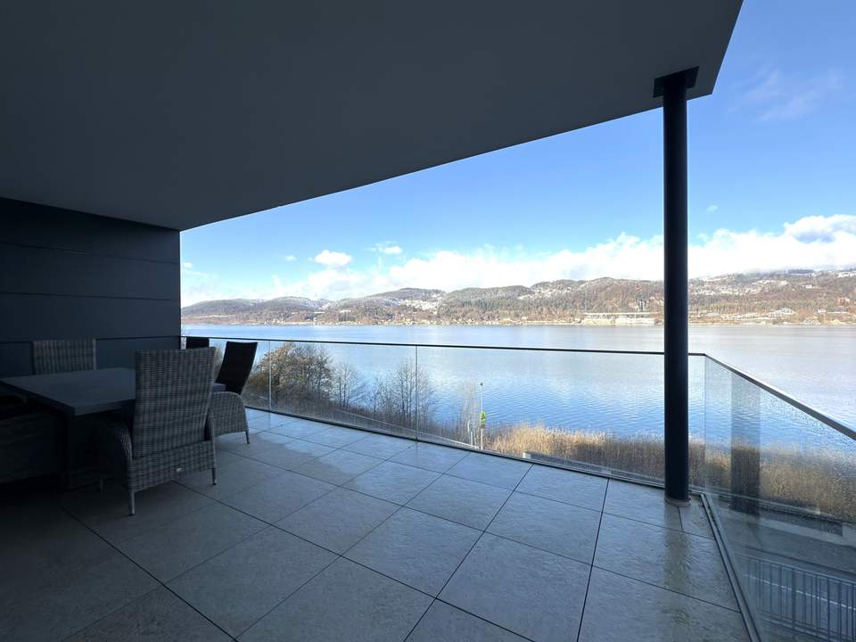 Luxusapartment mit unverbaubarem Panorama-Seeblick und privatem Seezugang am Wörthersee