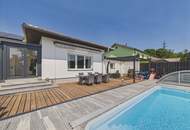 Moderner Bungalow mit Pool, Garage und Traumgarten – Wohnen auf einer Ebene