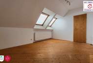 Helle Dachgeschoss-Maisonette mit zwei traumhaften Terrassen und Tiefgaragenplatz