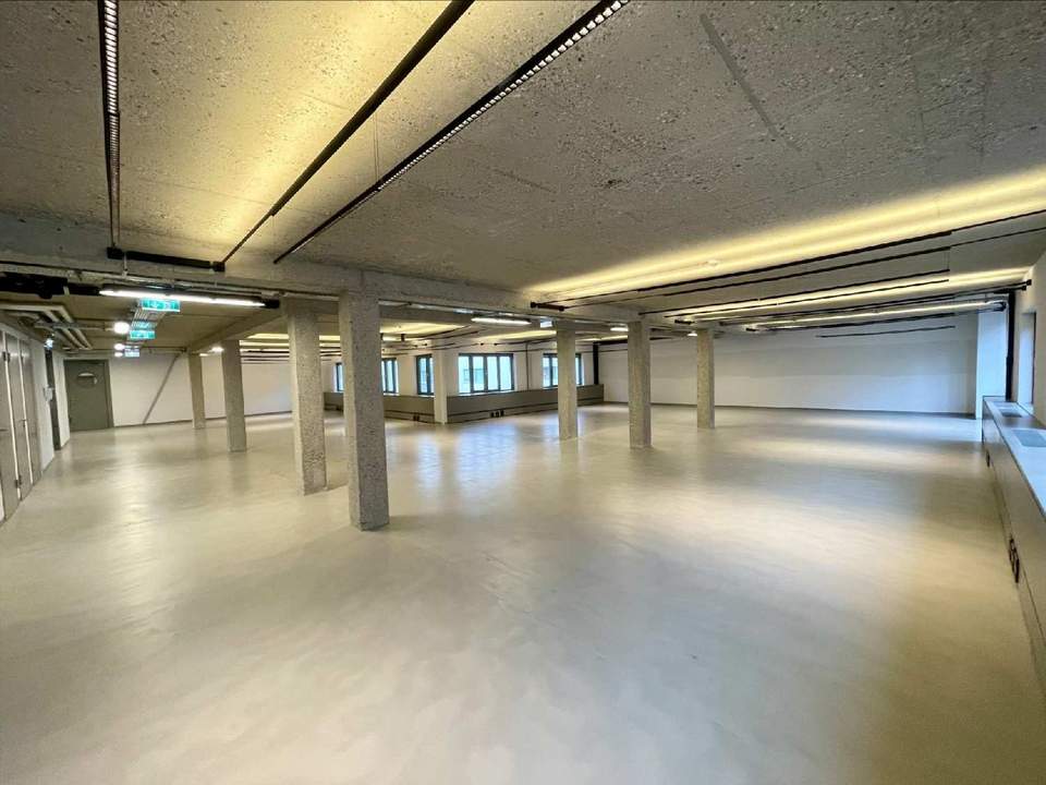 Urbanes Arbeiten im Industrial-Chic: Großzügige Open-Space Bürofläche in Top-Lage nahe Rochusmarkt