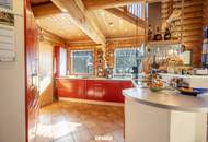Naturjuwel am Wallersee — massives Fichtenblockhaus auf außergewöhnlichem Grund