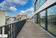 Exklusiver Dachgeschossausbau mit großzügiger Terrasse – Luxus und Nachhaltigkeit vereint