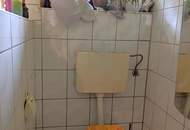 Sanierungsbedürftiger Bungalow mit großem Grundstück - in ruhiger, sonniger Lage