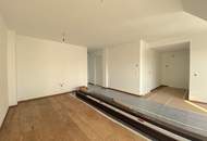 3-Zimmer Dachgeschosswohnung im 1.DG mit großem innenhofseitigem Balkon | Fernwärme | Erstbezug