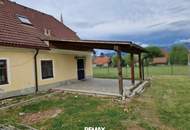 Teilsaniertes Einfamilienhaus mit großem Grundstück in ruhiger Lage