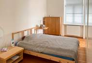 Helle Altbauwohnung mit Balkon und Wohnküche in bester Lage