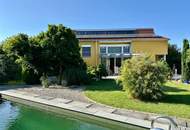 Exklusives Wohnen mit Schwimmteich & Galerie - Ihr zu Hause wartet