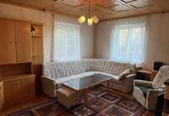 teilsaniertes Doppelhaus mit Keller und Garage auf schönem großem Grundstück zu verkaufen