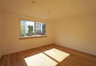 Satzberg: Exklusive Maisonettewohnung mit Stellplatz, kleinem Garten und Traum-Terrasse - ERSTBEZUG