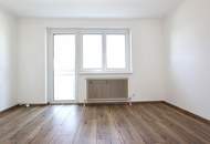 Schöne Erdgeschoss 3-Raum-Wohnung mit Balkon und PKW-Abstellplatz