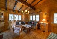 „Wohnen im Einklang mit der Natur – Stilvolles Holzhaus in traumhafter Ruhelage auf unverbaubarem Grundstück“