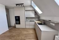 Erstbezug nach Sanierung! 2-Zimmer-Dachgeschosswohnung mit Terrasse, Balkon, Lift und Stellplatz!