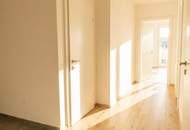 Geförderte Neubauwohnung mit Terrasse im 1. Stock