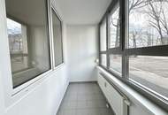 Exklusives Wohnen: 2-Zimmer-Wohnung mit Terrasse, Gartenidylle und Wintergarten