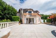 Elegantes Haus mit großzügiger Terrasse und gepflegtem Garten