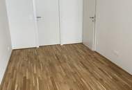 2-Zimmer-Neubauwohnung inkl. Komplettküche, 28m² Terrassen Außenfläche und Kellerabteil / K3-25