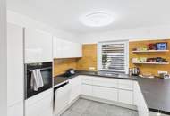 Traumhafte Terrassenwohnung mit Seeblick in Seeboden am Millstätter See. Neuwertig. Modern.