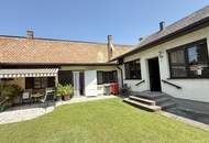 Großes Einfamilienhaus mit Veranda und Wirtschaftsanbau mit uneinsichtigen Garten + Ausbaupotential!