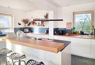 Energieeffizientes Einfamilienhaus mit großem Garten in zentraler Lage