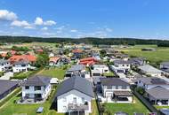 Moderne Gartenwohnung mit großzügigen Terrassen in sonniger Ruhelage