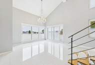 Wohntraum der Extraklasse: Exklusives Penthouse auf 2 Etagen mit großer Terrasse und schönem Garten in begehrter Lage