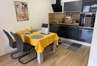 Moderne und helle 2-Zi-Wohnung mit Balkon & Tiefgarage an der Grenze zu Wien
