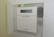 Haus in Grünruhelage mit offener Terrasse, Balkon und Garage