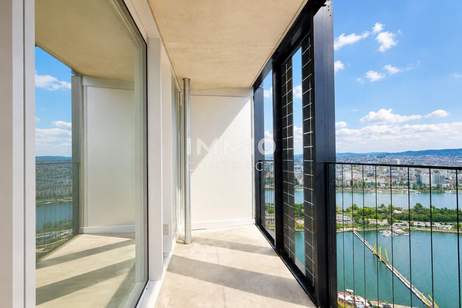 Abendgold über Wien: 33. Etage West-Studio im DC2 Tower mit 10 m² Loggia, Wohnung-miete, 1.100,00,€, 1220 Wien 22., Donaustadt