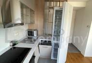Dachgeschossmaisonette mit einer Traumterrasse und vollmöblierter Küche