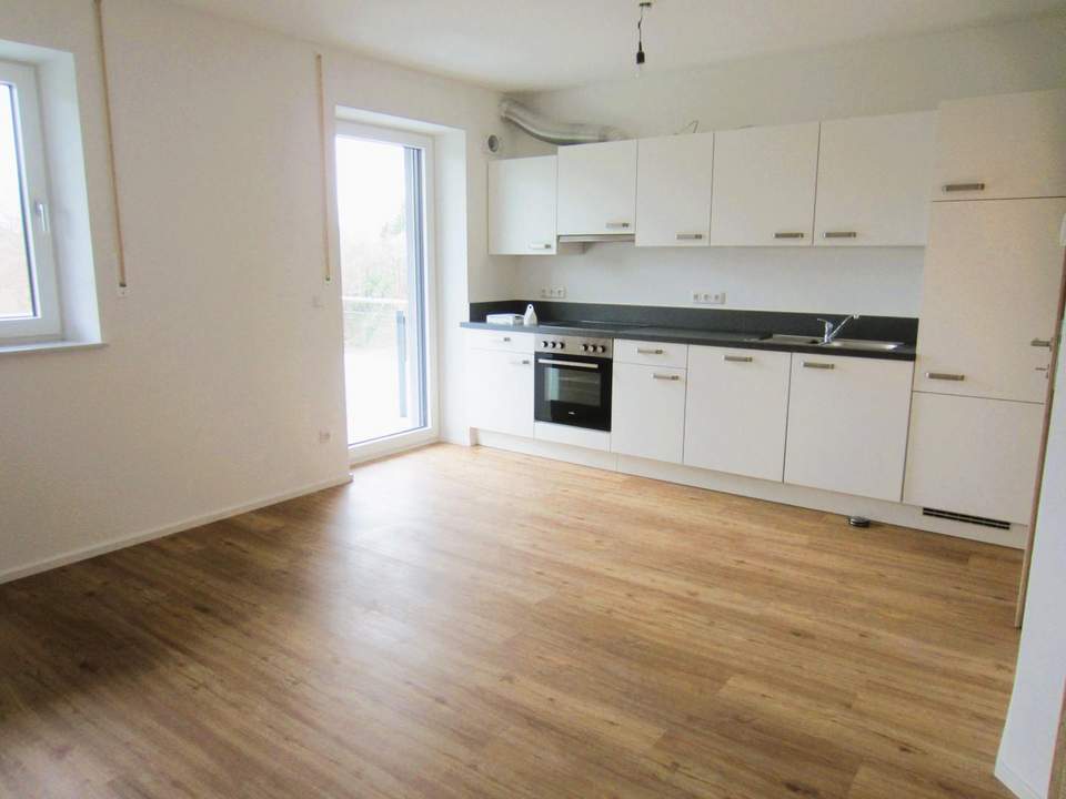 Exklusive 2 Zi.-Wohnung mit Balkon und Carport