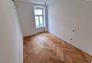 Revitalisiertes Altbaujuwel – alles, was das Herz begehrt! 3-Zimmer-Wohnung mit Klimaanlage, Terrasse, Luftwärmepumpe &amp; edler Ausstattung mit Fischgrätparkett – überzeugen Sie sich selbst