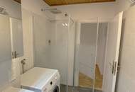 Dachgeschosswohnung in idealer Lage: 2 Zimmer, 2 Terrassen und große Garage erwarten Sie!