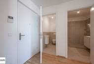 Wohnen im Bel Atrium: Zwei Zimmer Neubau Wohnung mit Balkon, inkl. Stellplatz und vielen Extras