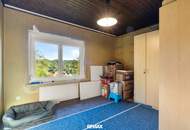 Ihr Rückzugsort in ruhiger Südhanglage! Vollunterkellerter Bungalow mit gut 5.500 m² Grundstück