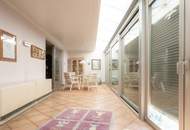 Ruhelage: Gepflegter Bungalow mit Wintergarten und Doppelgarage