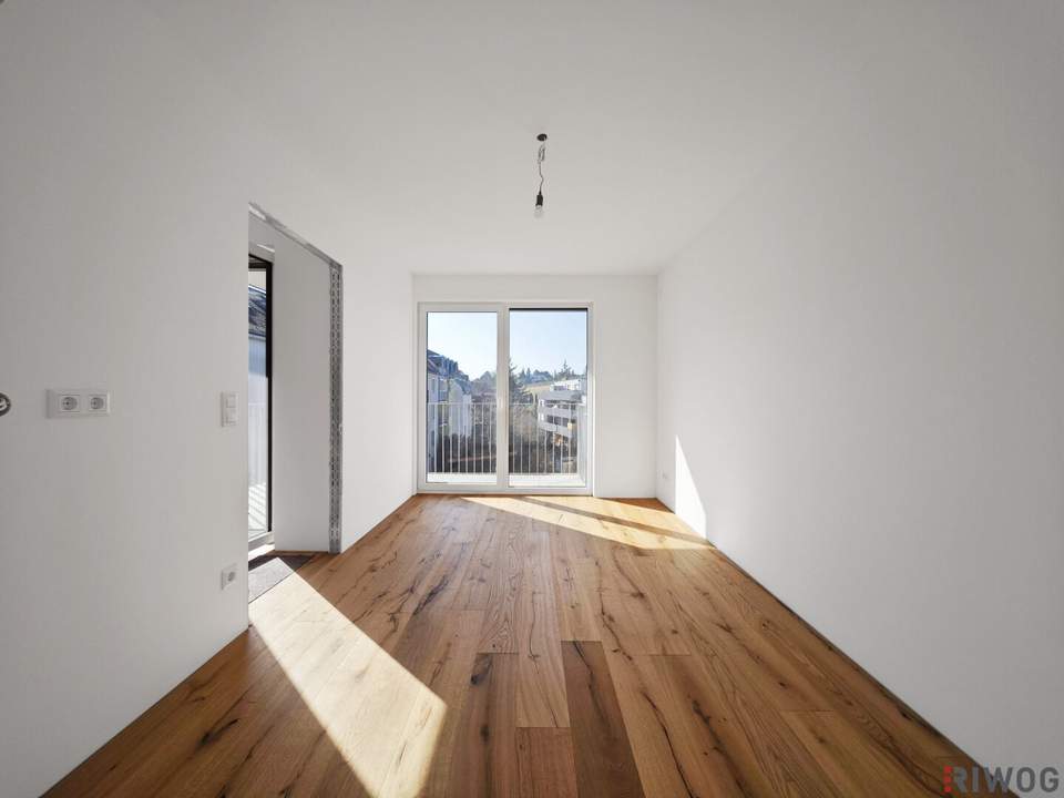 Heller Erstbezug | Hofseitige 2-Zimmerwohnung mit Balkon | Luftwärmepumpe | nähe Liesing &amp; Riverside